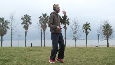 Young-Boy-Dancing-In-Park