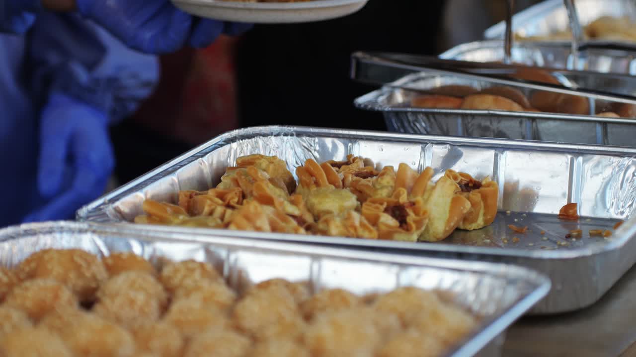 Traditional chinese spicy chicken gizzards close-up. Asian chicken stomach popular food. Local street food market outdoor. High quality 4k footage