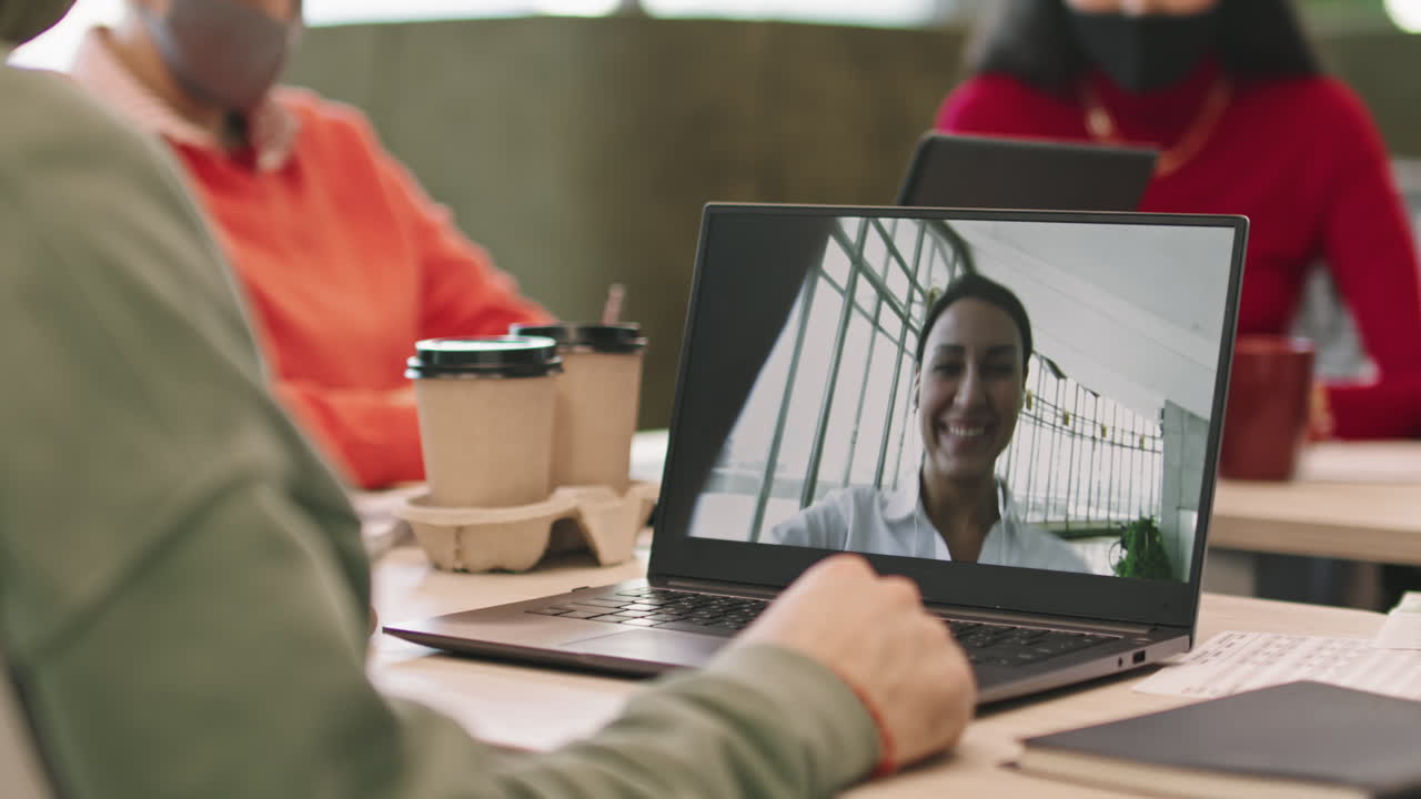 Businessman Talking on video Call with Businesswoman