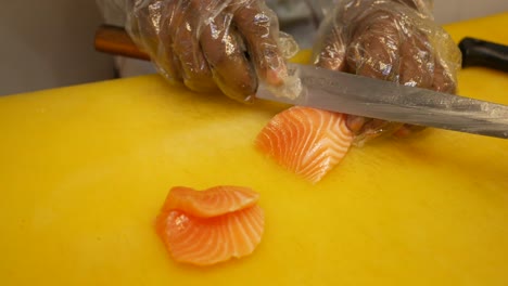 chef preparing salmon sashimi