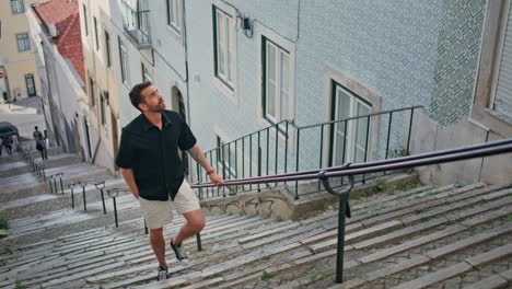 traveler walk street stairs on summer trip. tourist enjoying authentic houses