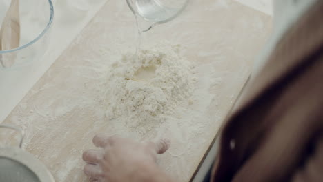 bread, kitchen and chef hands with flour