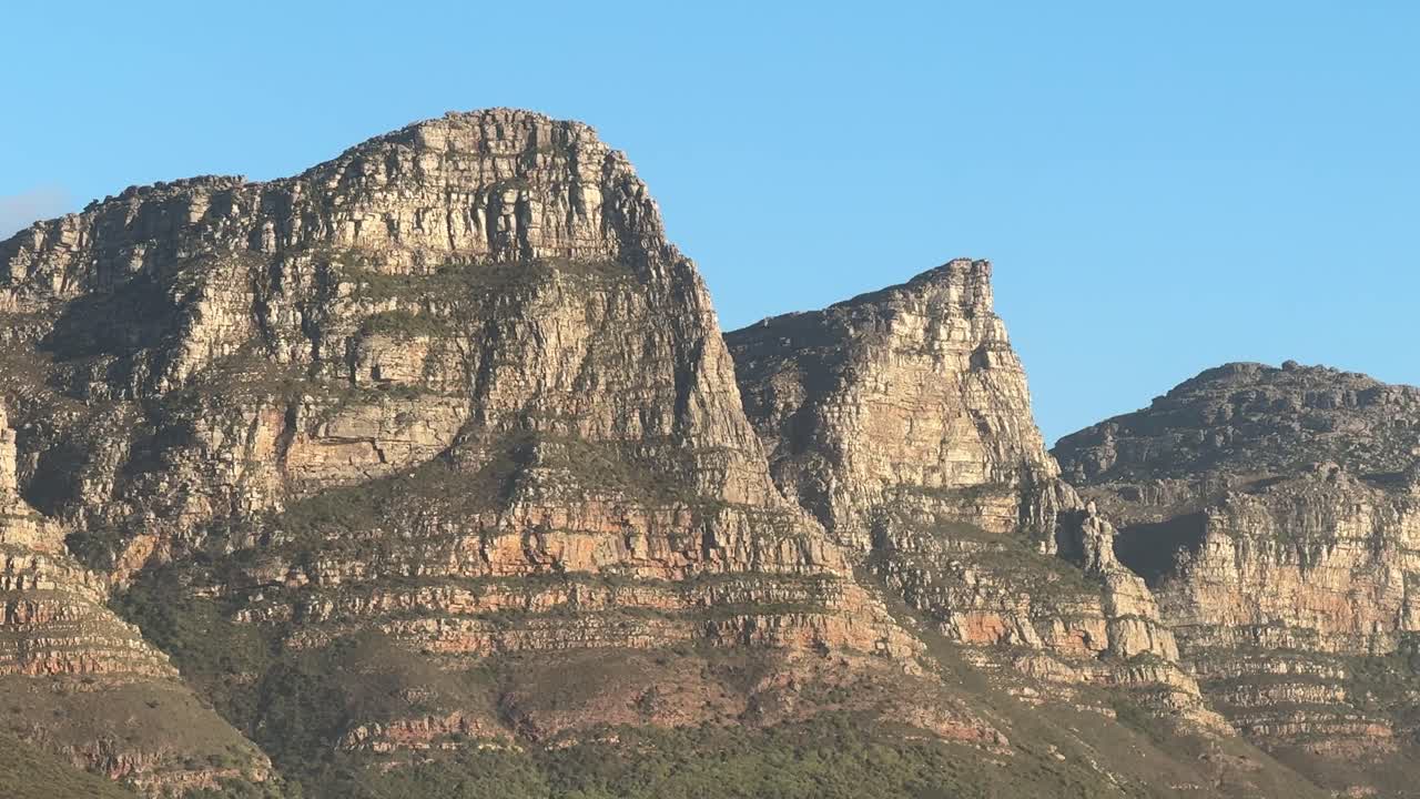 The 12 apostles mountain range in Cape Town, South Africa in late afternoon sunlight.