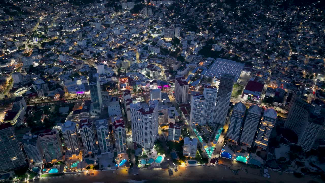Aerial night view over Acapulco’s hotel area, Mexico
