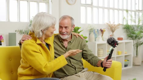 Senior couple creating a video blog