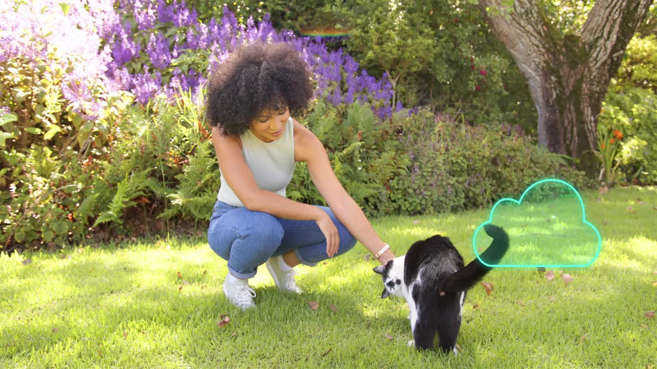 Woman kneeling on lawn petting cat, teal cloud overlays appearing guiding cat for pet care