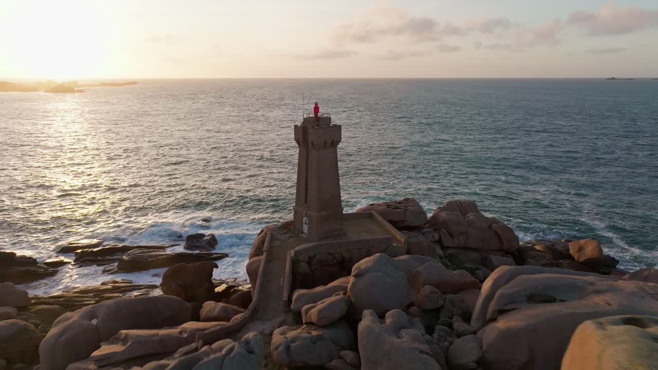 Quick approach shot of Phare Du Mean Ruz Lighthouse in Bretagne France during sunset