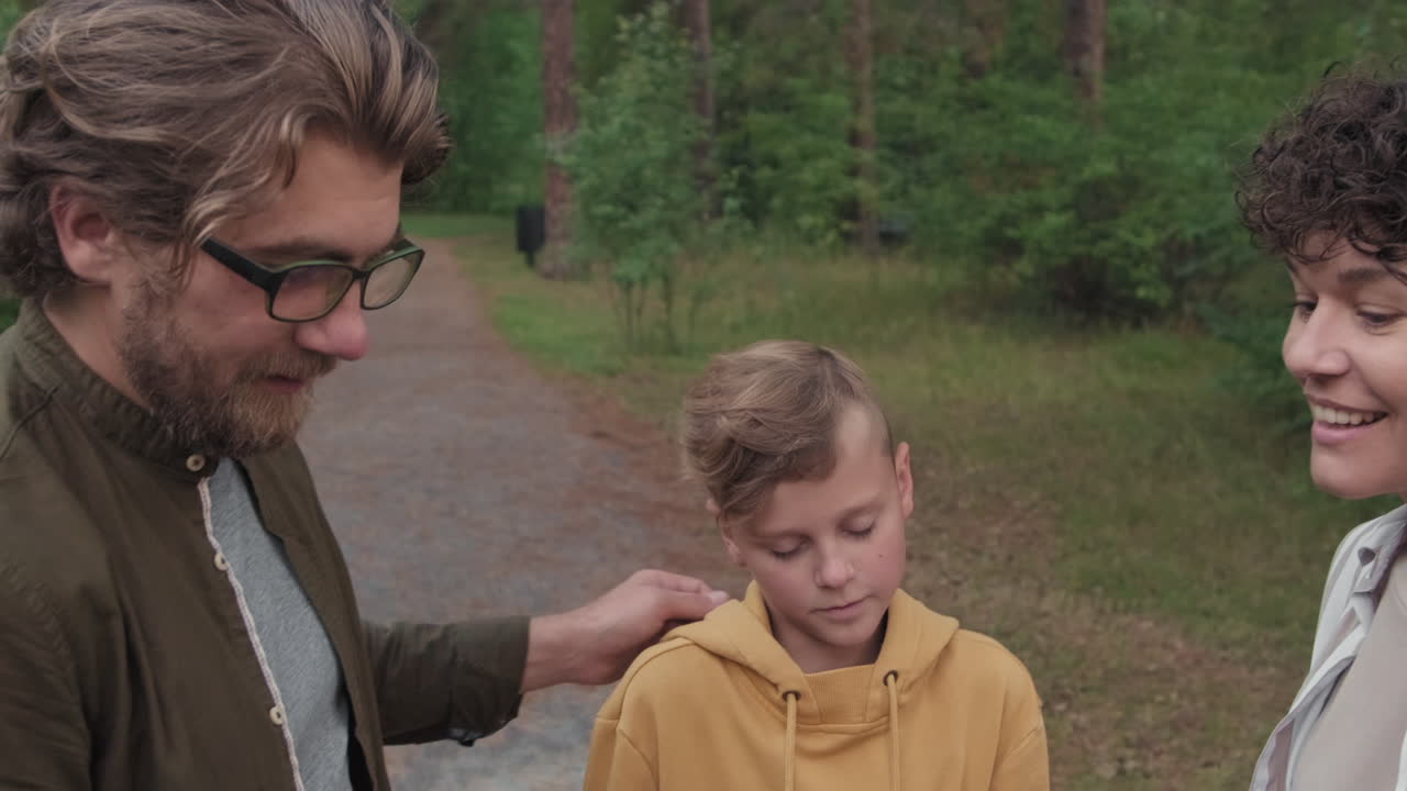 Taking Family Selfie In Woods