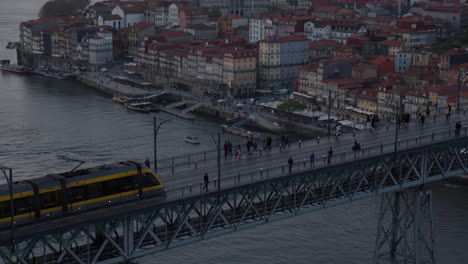 porto subway crossing the dom luis i bridge at sunset. slow motion