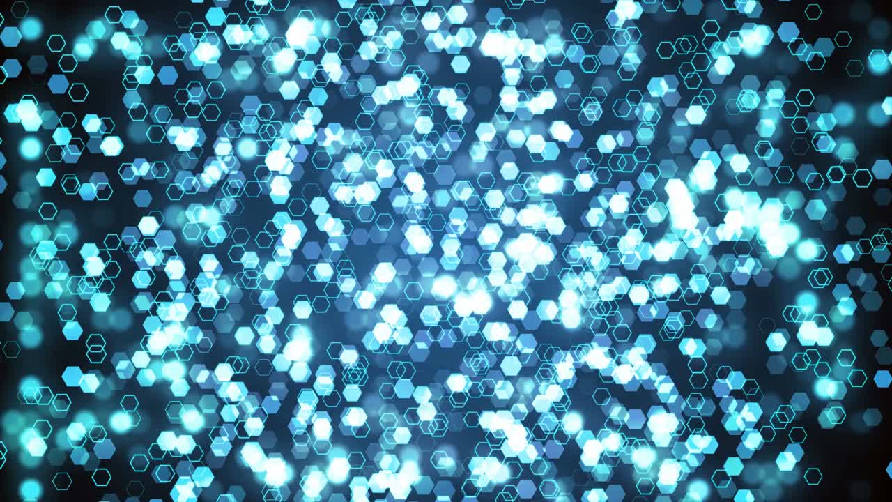 Blue glitter hexagon sparkles on dark background. Abstract animation.