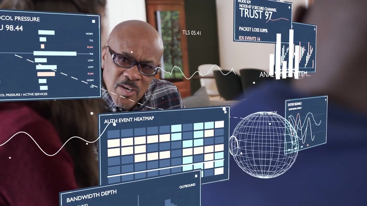 Senior man studying net panels appearing leaning in and speaking while team analyzing heatmap globe