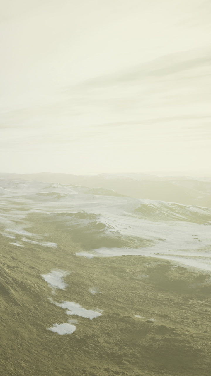 Expansive landscape bathed in soft sunlight revealing natures quiet beauty