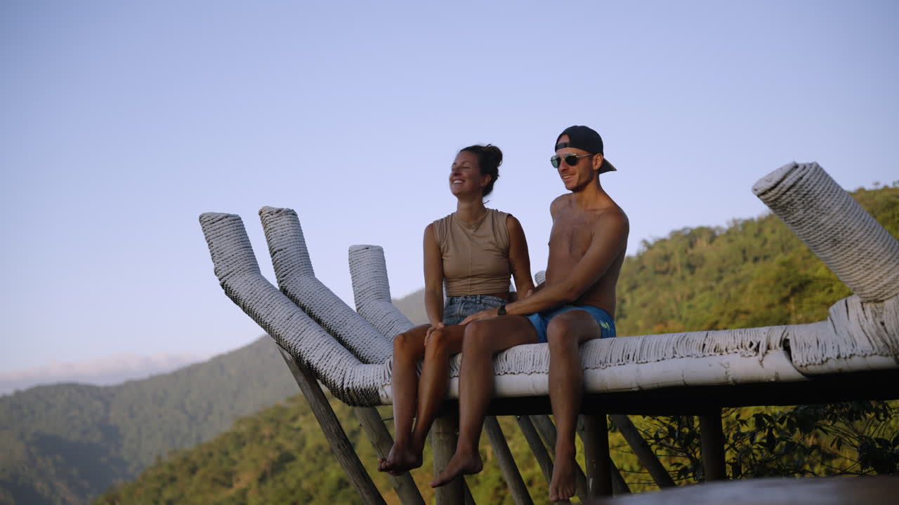 Couple chatting at a viewpoint with great atmosphere, Scenic moment, atmosphere rich with color, nature and exploration