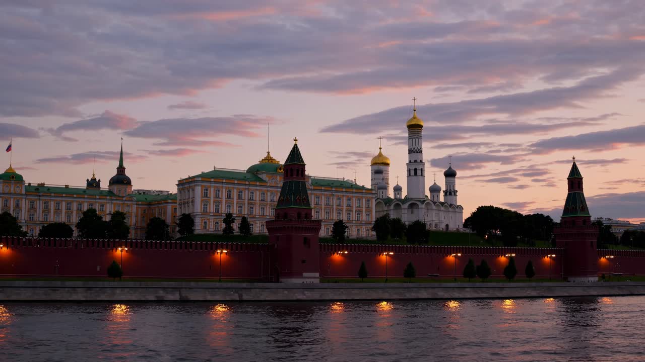 Twilight video scene of a historic cityscape with golden domes, captured from a low angle