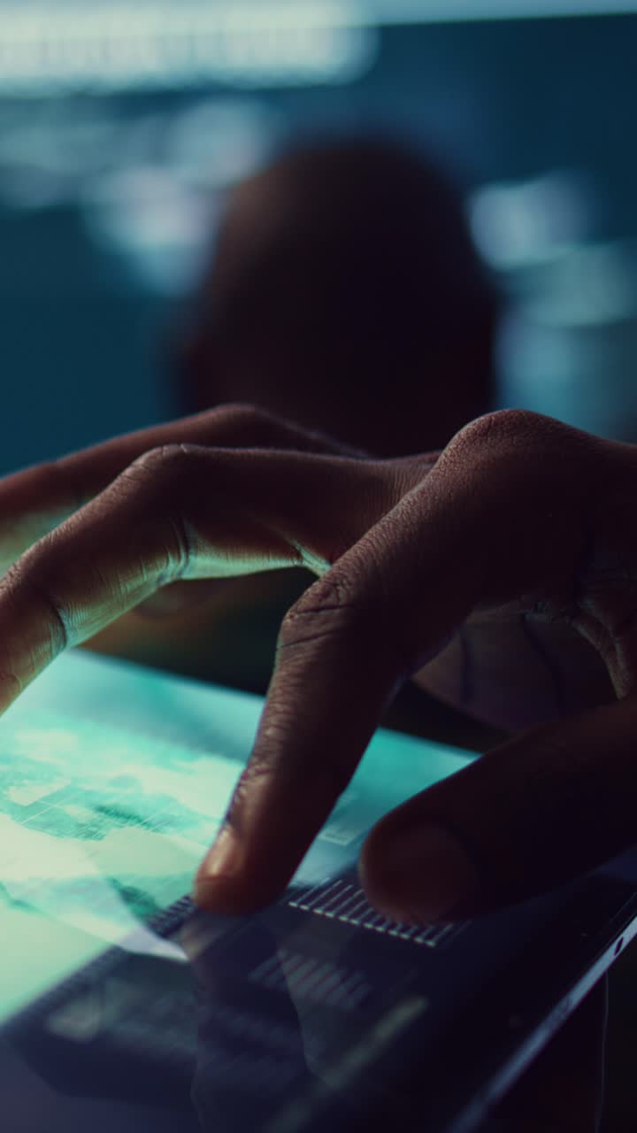 Close-Up of Hand Interacting with Digital Tablet Screen
