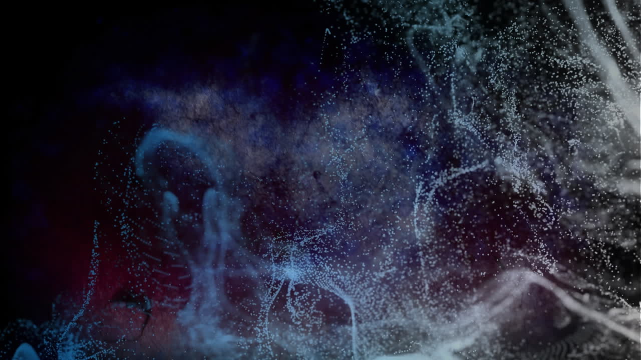 animación de partículas brillantes que se mueven sobre un fondo negro