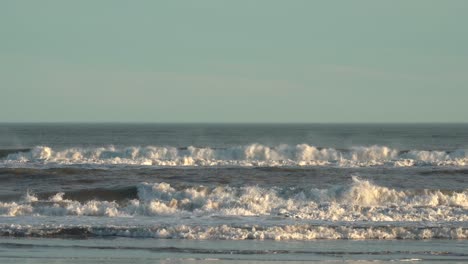 extreme waves crashing in atlantic ocean on a sunset - new jersey, usa - medium shot
