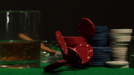 chips falling and bouncing on casino table