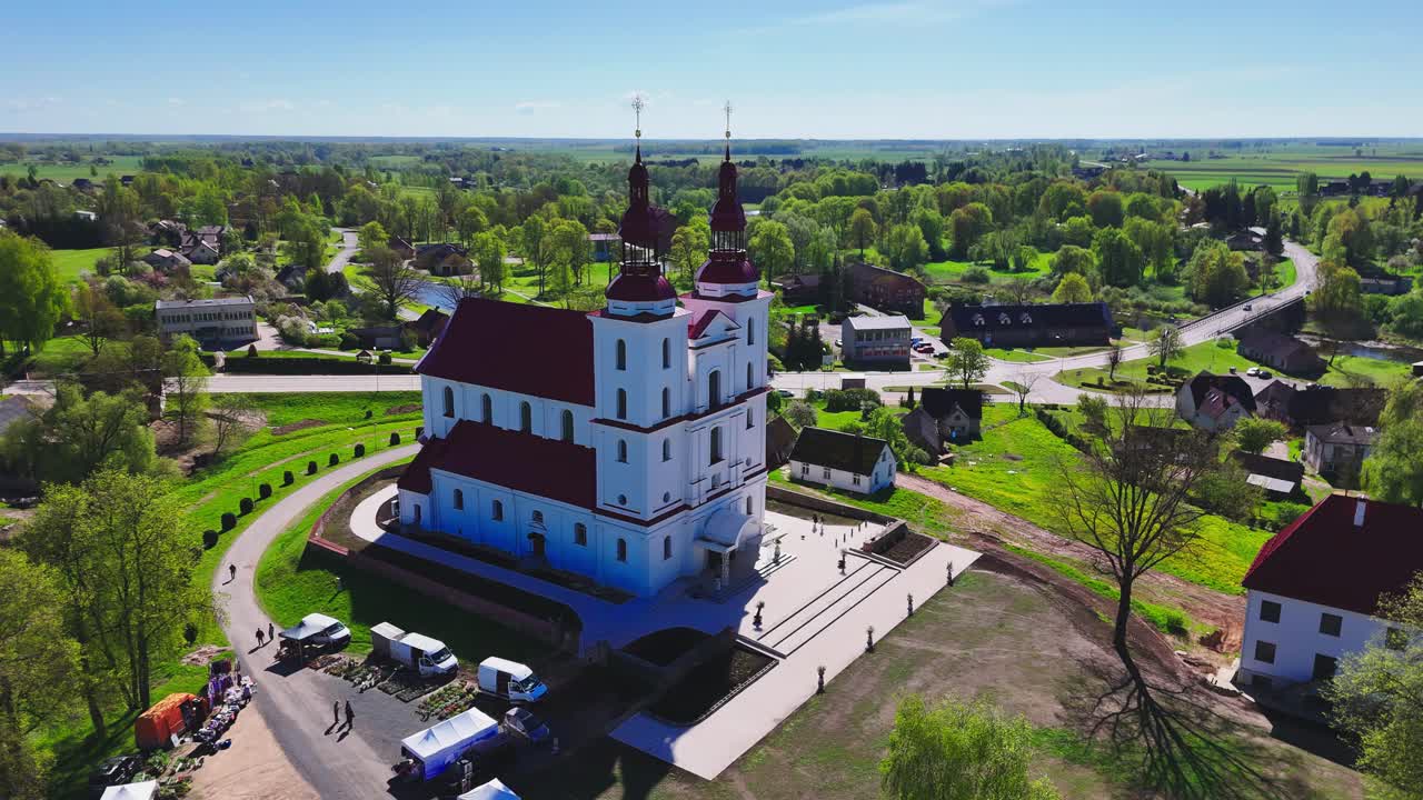 Majestic Architecture Of The Rural Church of the Assumption of the Blessed Virgin Mary, Skaistkalne In Latvia. Aerial Drone Shot