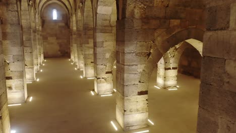 interior of historical monumental building with stone arches and domes