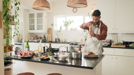 man cooking in a modern kitchen