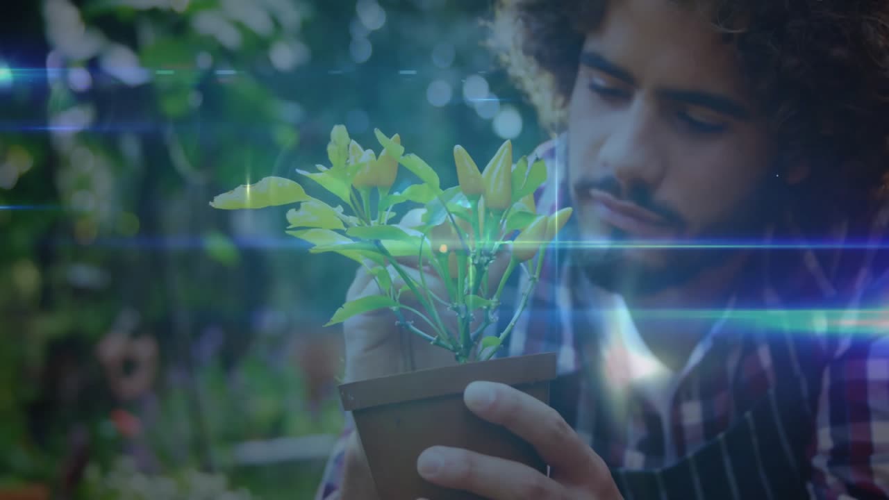 Uomo che studia una pianta in giardino e attiva un'interfaccia digitale espandibile con nodi per la tecnologia