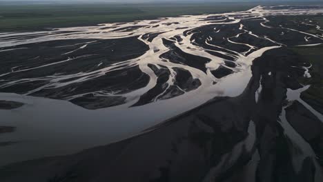 breathtaking river landscape in iceland countryside, aerial at sunset