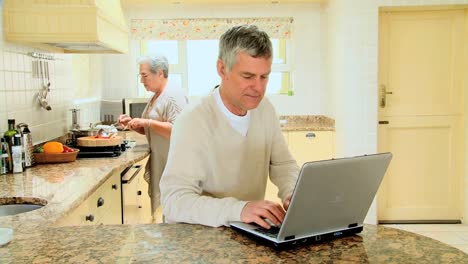 mature couple in kitchen