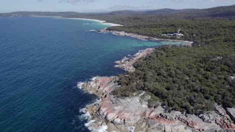 Aerial-View-Of-Sloop-Rock-Rocky-Coastline,-Cosy-Corner-North,-And-Swimcart-Beach-In-Tasmania,-Australia