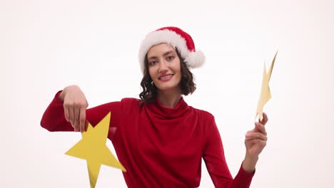 Young Woman in Santa Hat Holding Stars