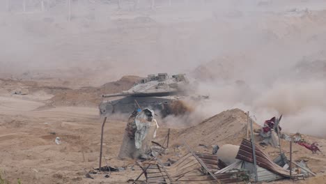 An-army-battle-tank-at-the-border-of-Gaza,-Armoured-combat-fighting-vehicle-in-destroyed-city-of-Gaza-dust-during-Israel–Hamas-war-conflict-2023