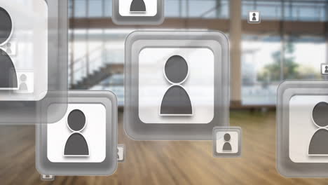 animation of icons floating over blurred office space