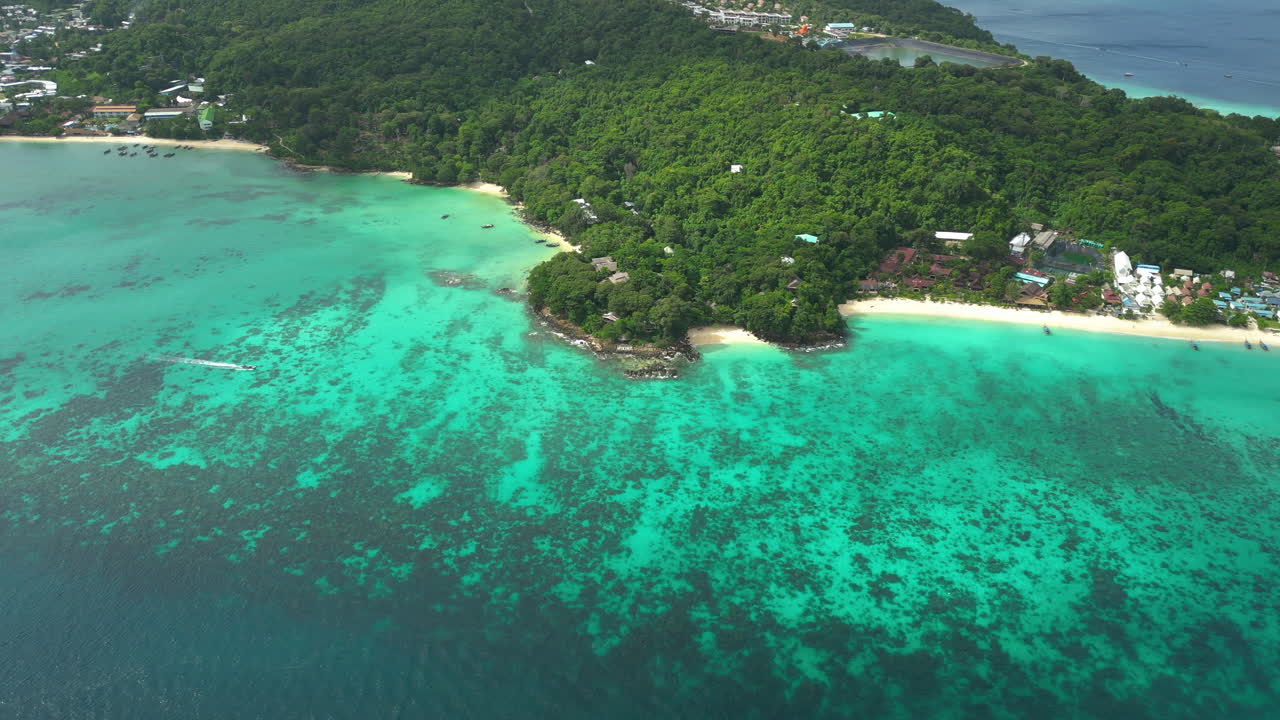 Aerial pan left of Long Beach Phi Phi on sunny day, Thailand