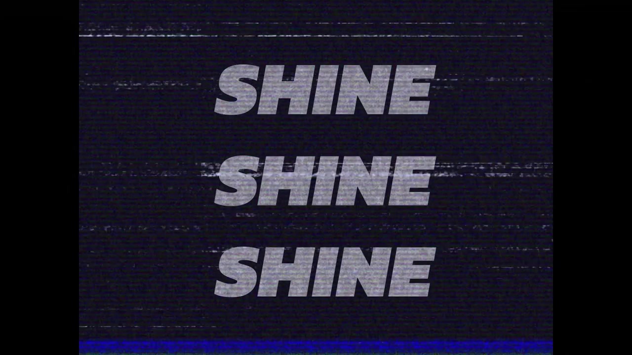 Animation of shine text in grey over data processing and interference on black background