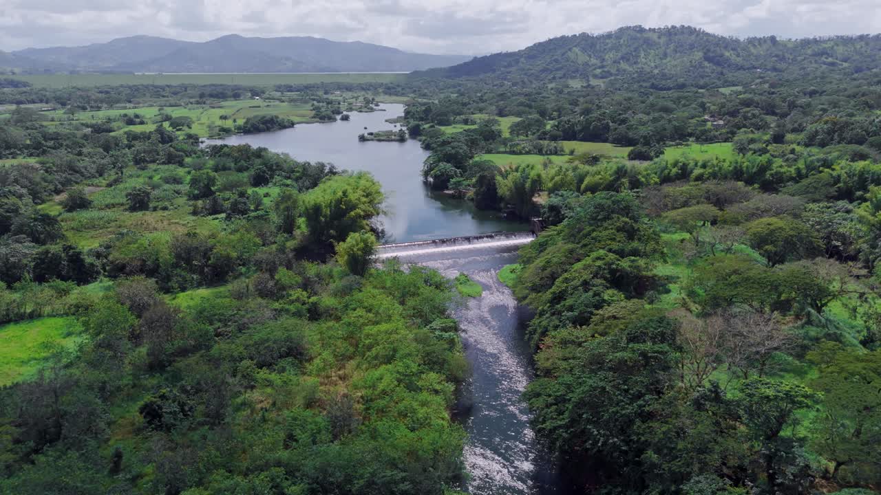 Agricultural irrigation dam, Hatillo, Cotui in Dominican Republic. Aerial forward descending