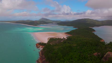 hill inlet lookout aerial drone view static shot whitsundays island whitehaven beach north end cloudy sunny summer spring autumn scenic flight tourist clear blue waters sandy national park backwards