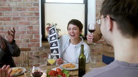 people eating lunch and celebrating together