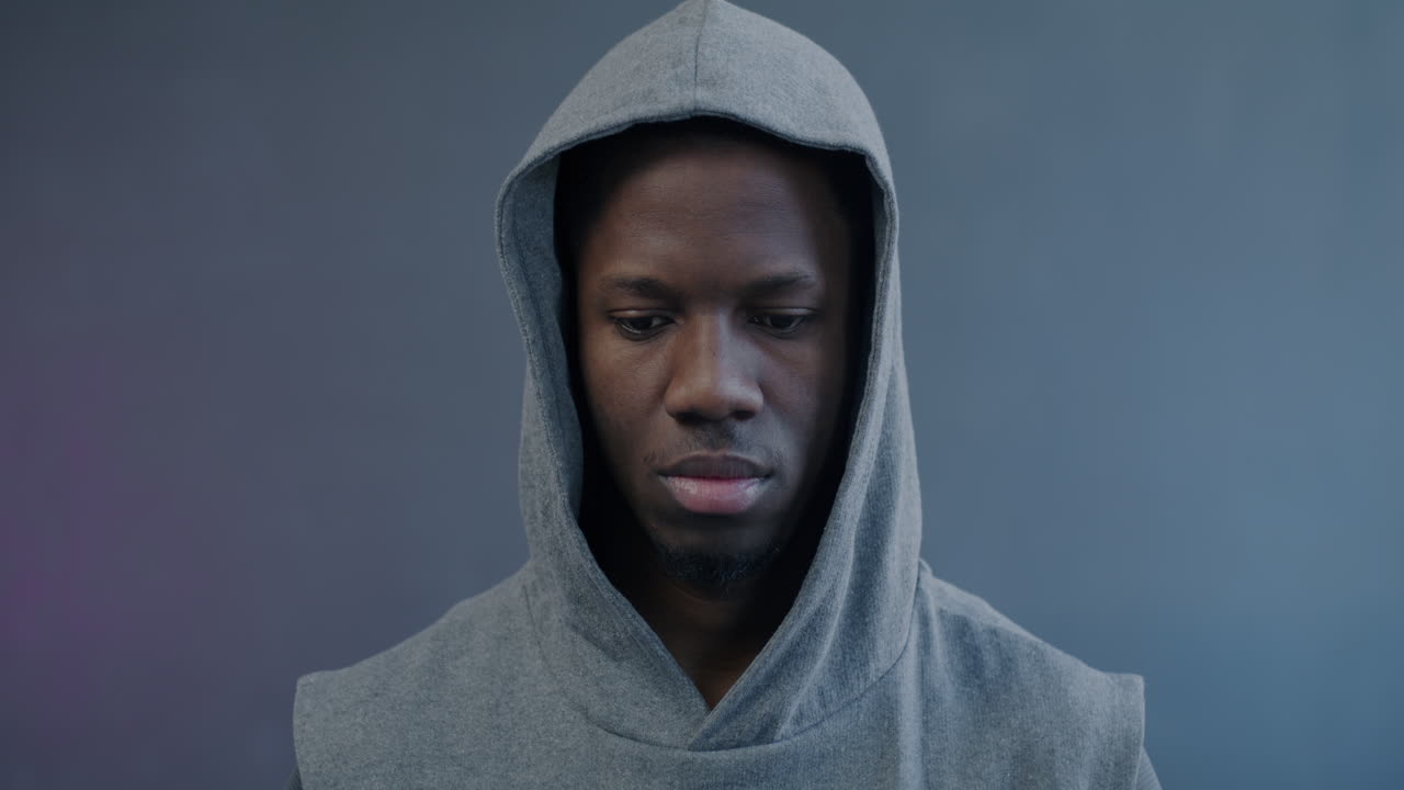 Man Wearing a Gray Hoodie