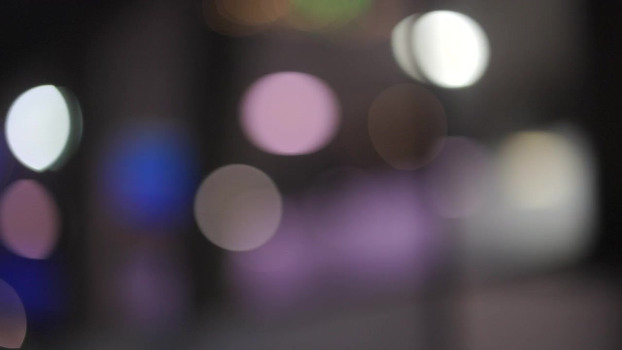 Abstract Bokeh Lights Background with Soft Blurred Circles in Warm and Cool Tones"