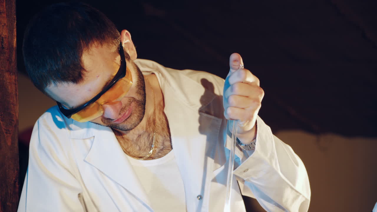 Scientist conducts experiments with chemical reagents. Process of creating a medicinal product. Medical Scientific Equipment