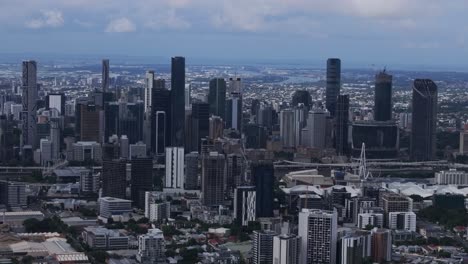 Skyline-skyscraper-cranes-Brissy-Brisbane-City-River-South-Bank-Park-Quay-ferry-boat-Australia-aerial-drone-Glass-House-Mountains-grey-cloudy-morning-summer-autumn-winter-Aussie-forwards-motion