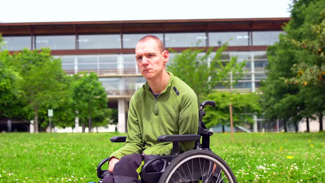Man in wheelchair on lawn