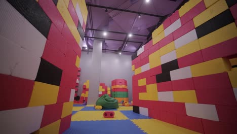 colorful indoor playground with large building blocks