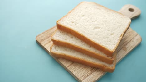 close up of stack of baked bread on table