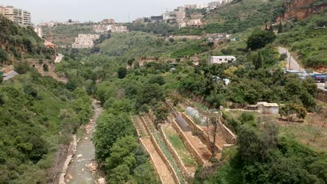 Aerial-Drone-Shot-Of-Zbeideh-Valley-Area,-Ancient-Roman-Aqueducts,-Lebanon