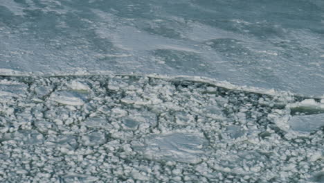 melting ice flakes seen from ship