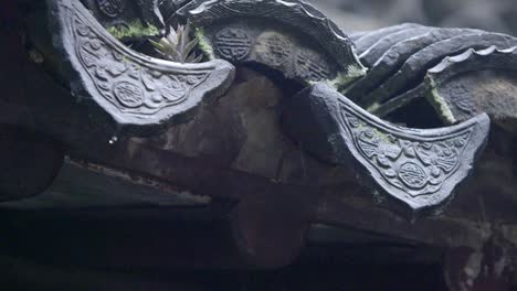 slow motion with rain drops from the china ancient temple eave