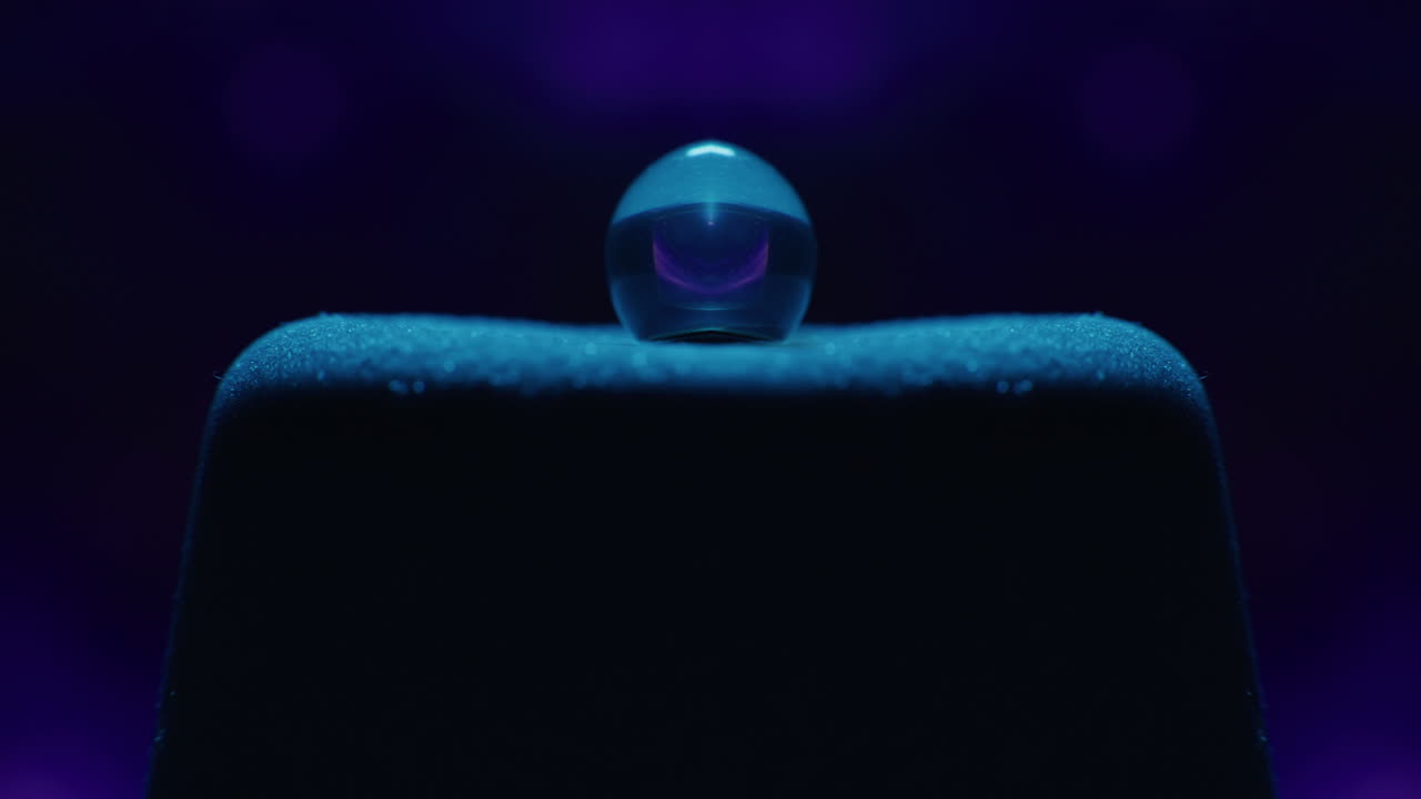 Water Drop Reflection on Dark Surface