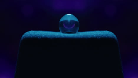 water drop reflection on dark surface