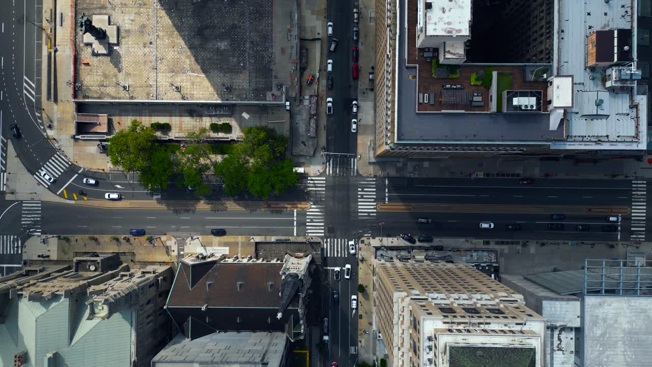 A drone shot looking straight down on the busy streets of downtown Philadelphia